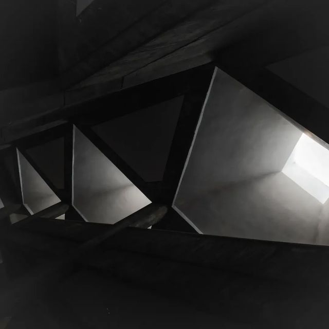 Brutalist strokes and light's graceful dance.